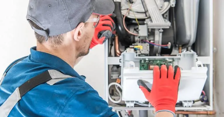 Representative image of furnace controls being examined