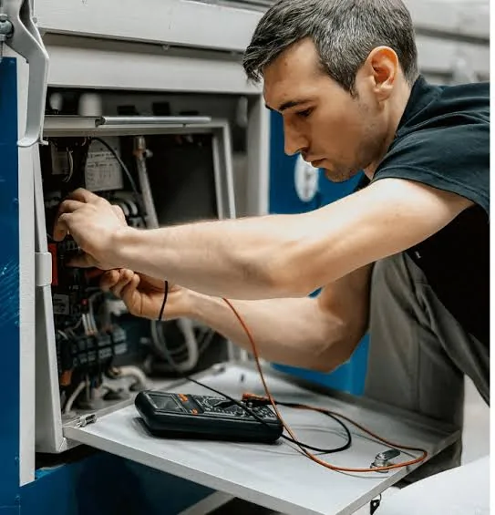 Representative image of electrical checks during HVAC equipment installation